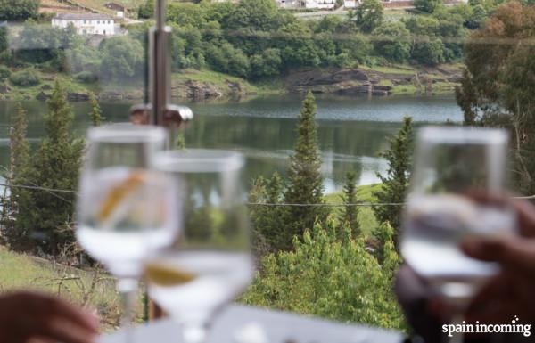 Summertime in the Camino: terraza with a view over the Río Miño - French Way