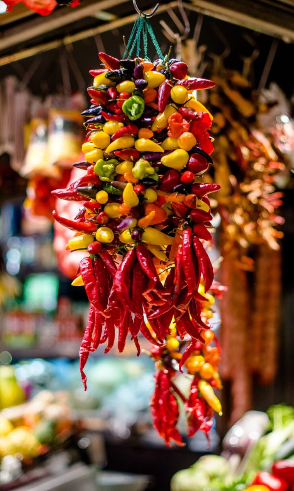 a bunch of hot peppers on the market in Spain