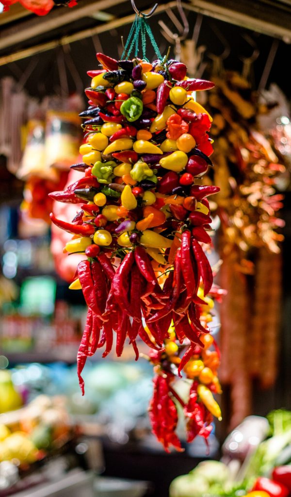 a bunch of hot peppers on the market in Spain