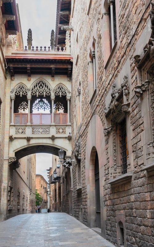 Famous mediveal Bridge between buildings and street in Barrio Gotic quarter of Barcelona, Spain