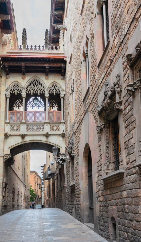 Famous mediveal Bridge between buildings and street in Barrio Gotic quarter of Barcelona, Spain
